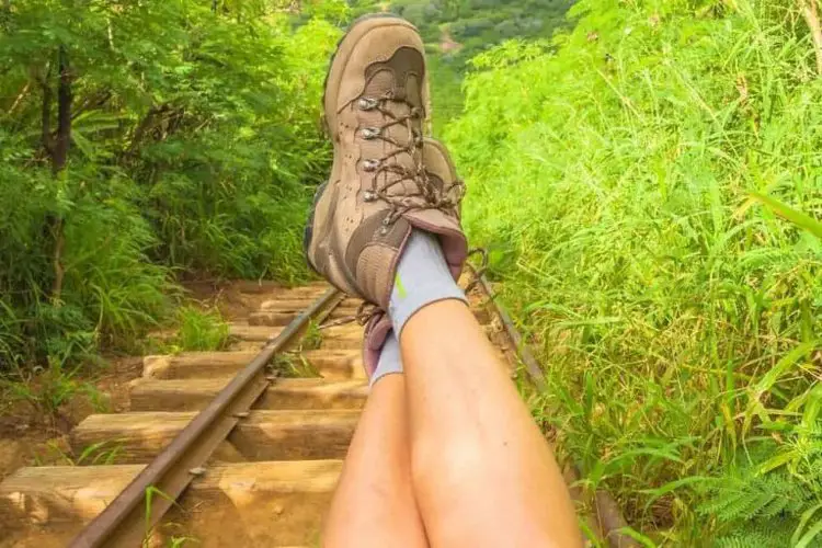 1 women hike at hawaii with her hiking boots