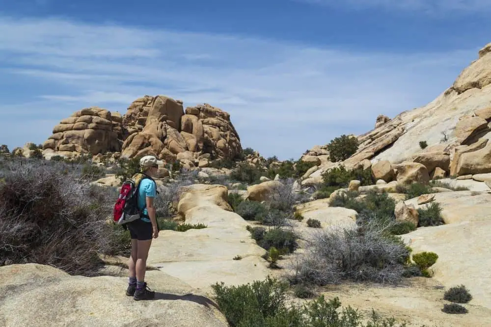 woman with hiking boots in Joshua Tree nation park