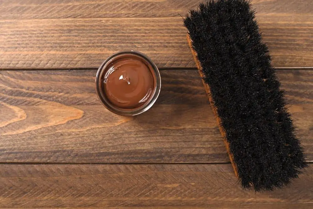 horsehair brush and brown dye for hiking boots