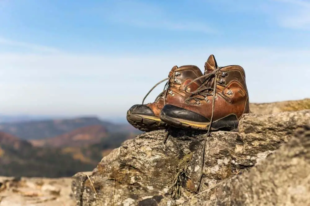 leather steel toe hiking boots on rocks