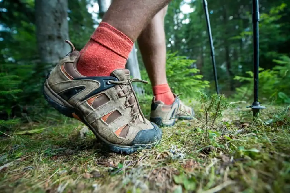 socks cushion the feet while wearing hiking boots in jungle