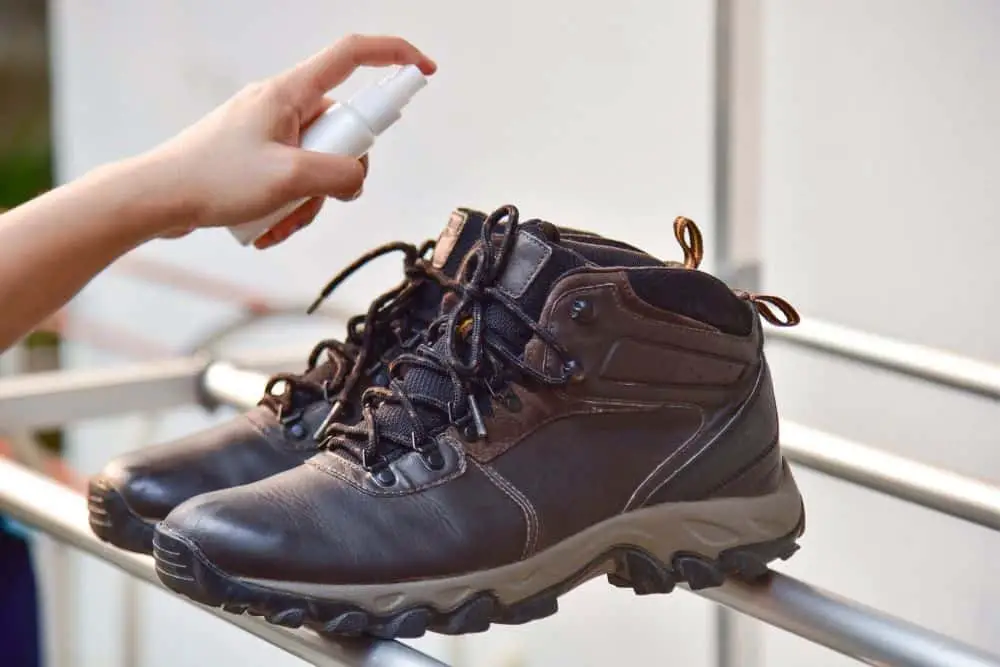spray alcohol on hiking boots to soften them
