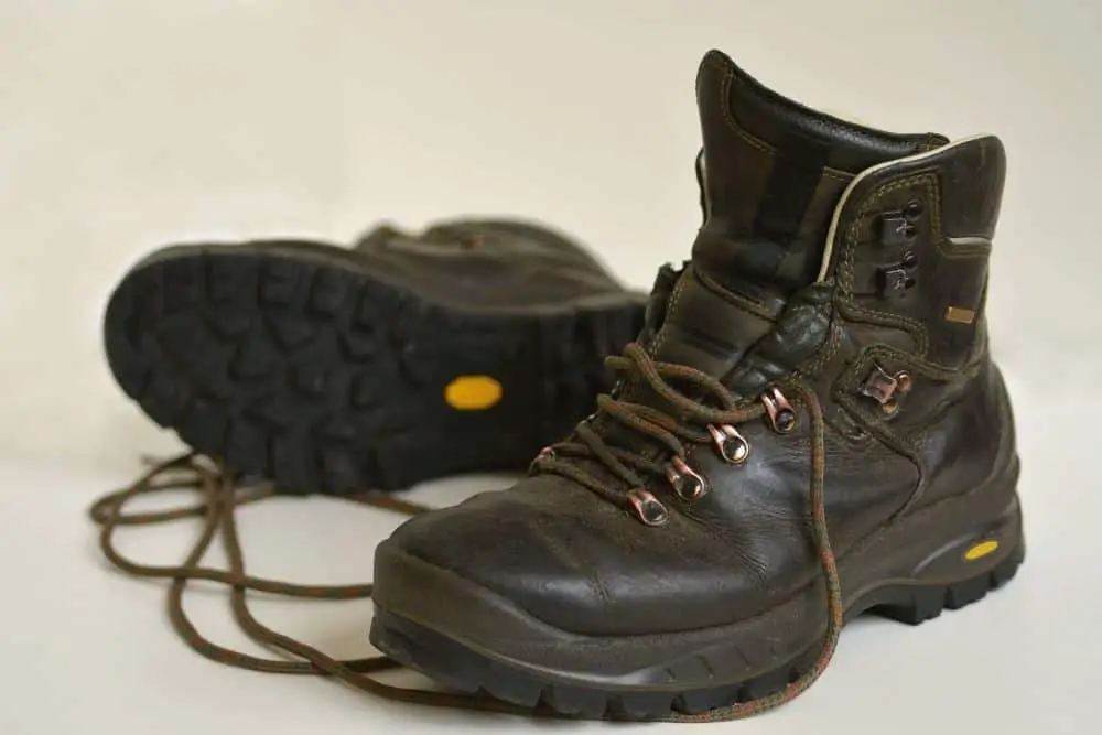 stretched hiking boots with some wrinkles on the leather surface
