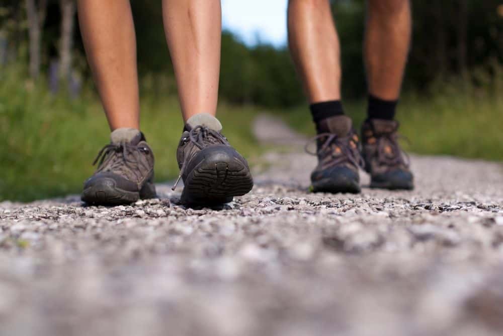 two men wearing lightweight hiking boots