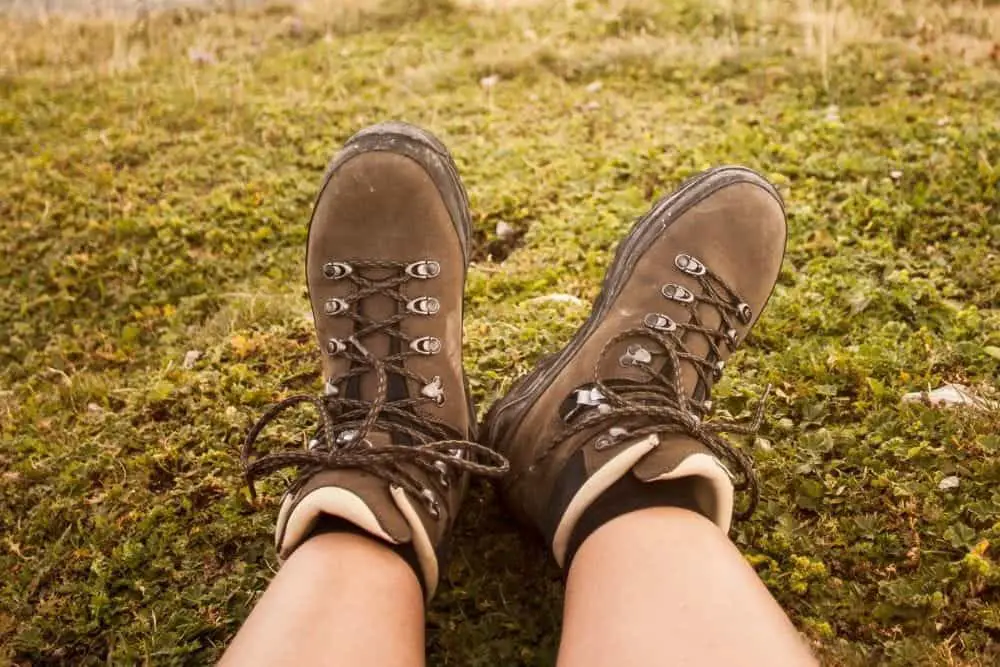 wear steel toe hiking boots sitting on grass