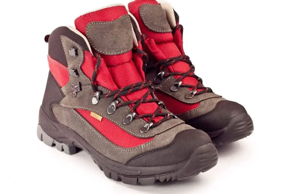 a pair of red brown hiking boots need waterproofing