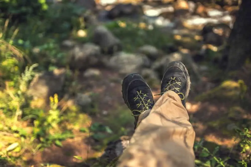 wearing durable hiking boots in forest