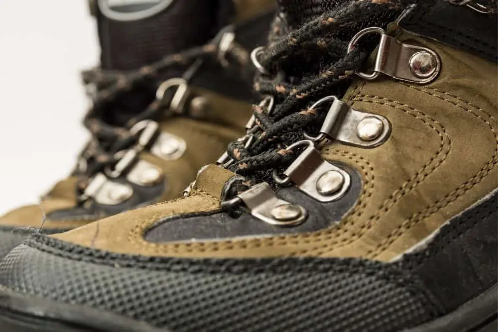 The uppers of hiking boots with hooks and laces