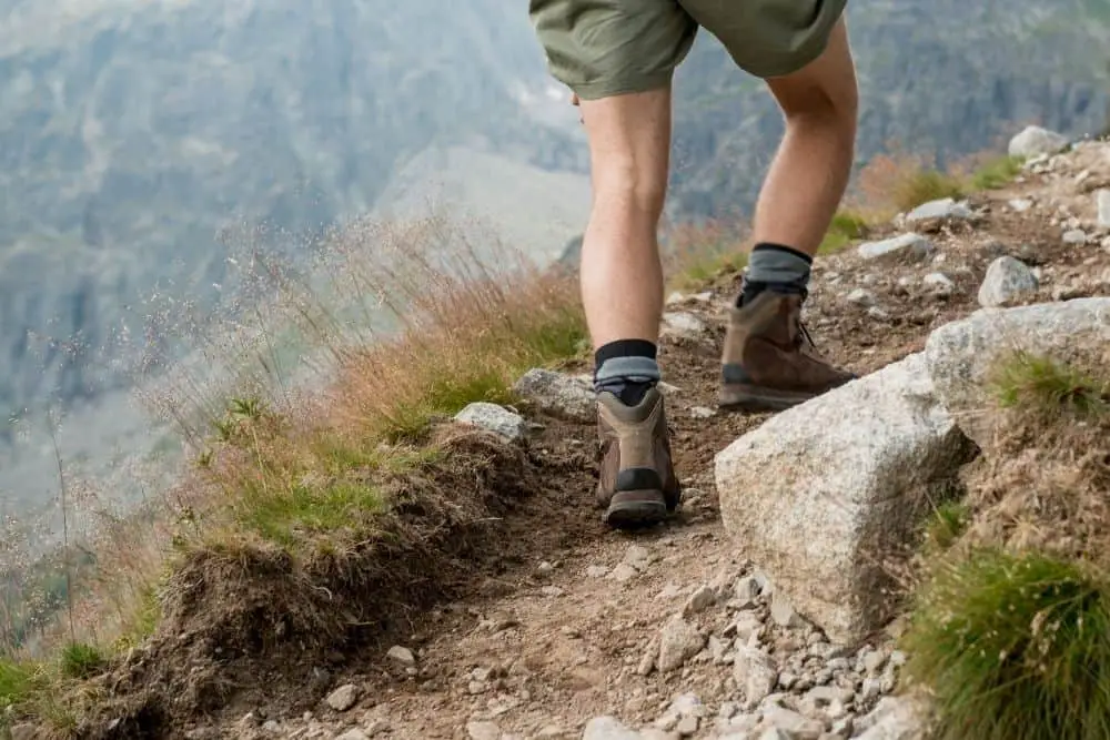 Wear hiking boots in rock terrain