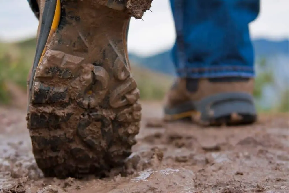 hiking boots with thick lugs in mud