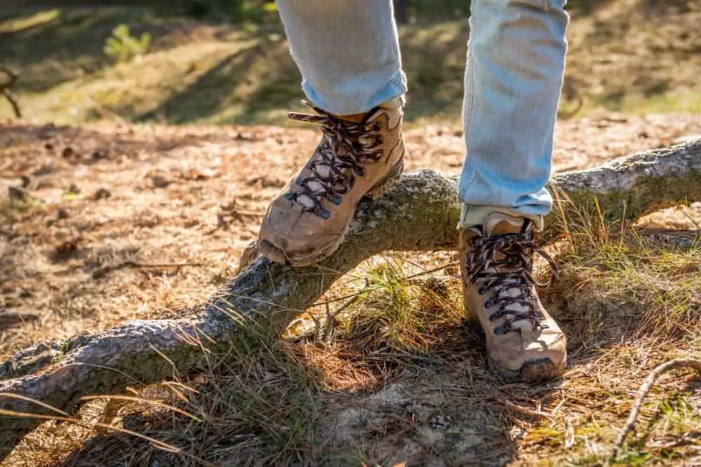 Men wear jeans with hiking boots