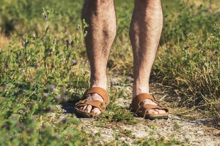 Man wear hiking sandals on the trails