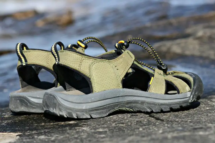 hiking sandals on the stream