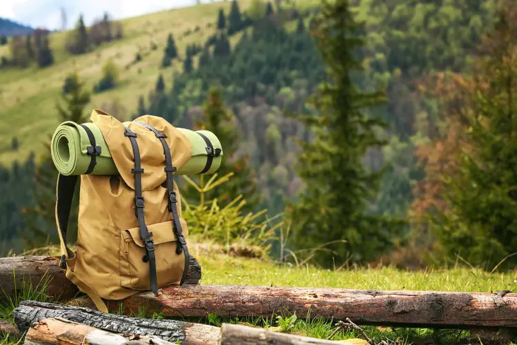 A hiking backpack is on the trail