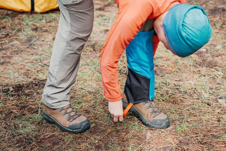 a man uses gaiters for hiking