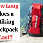 a red hiking backpack on the ground