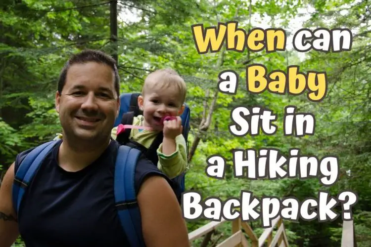 baby sit in a hiking backpack to go hiking with his dad