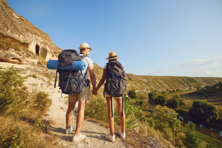 couple wears multi-day backpacks for their long trip