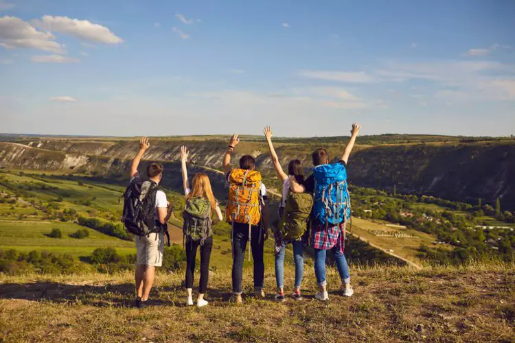 group of friends go hiking with hiking backpacks