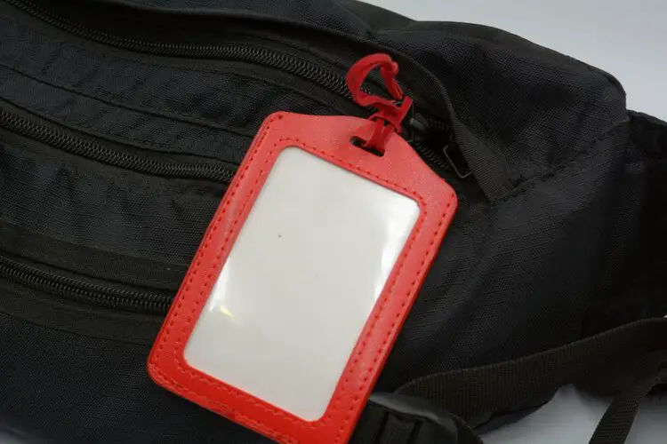 red luggage tag on a bag
