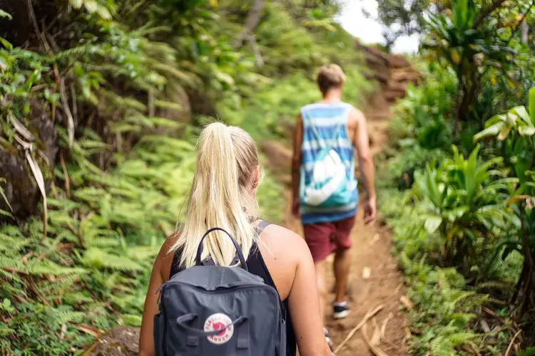 two people go on a short trip with small hiking backpacks