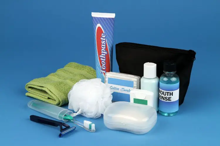Personal Toiletries on blue background