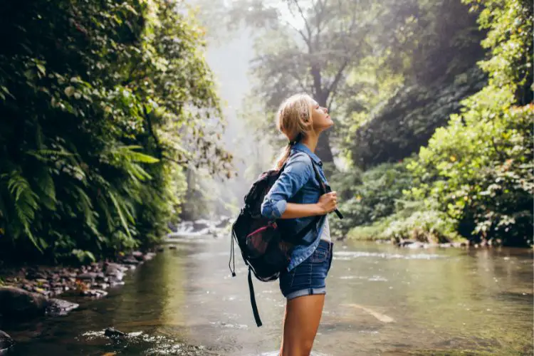 a girl enjoys the nature