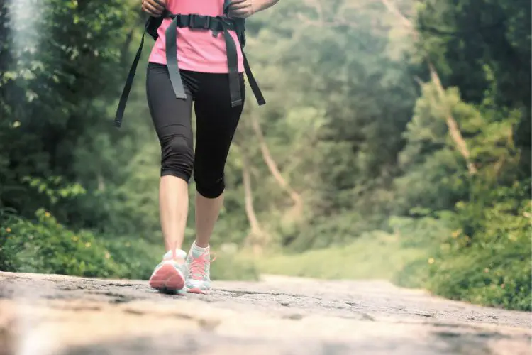 a girl goes hiking with leggings