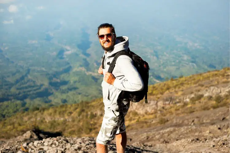 a man goes hiking in shorts