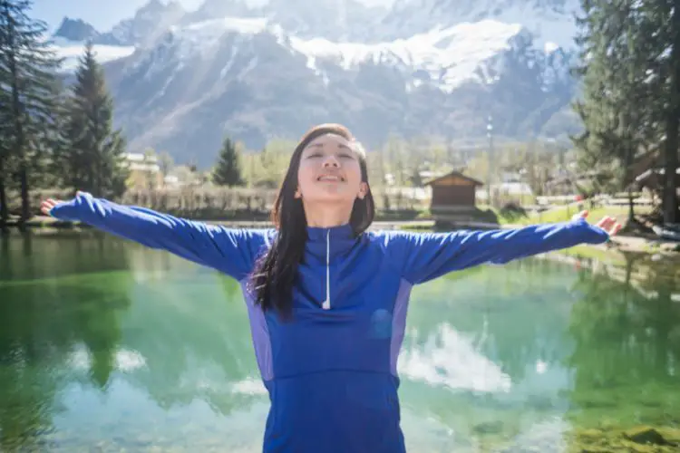 girl in the good mood while hiking