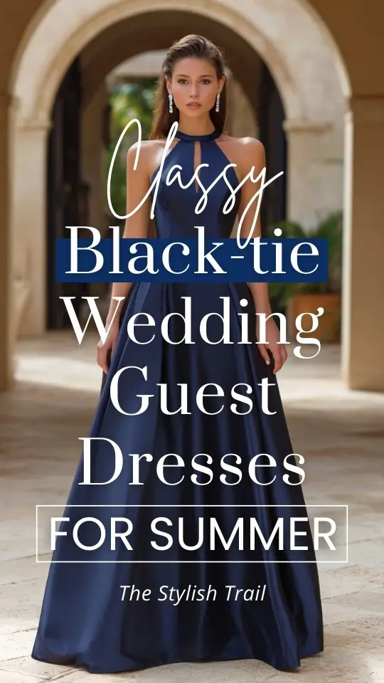 a woman wears a classy navy wedding guest dress for black tie summer wedding