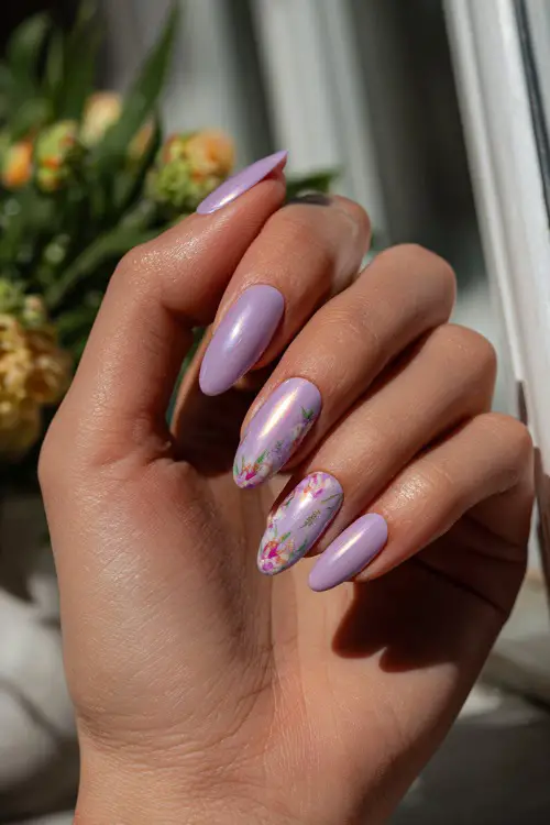 Hand reaching for bouquet on windowsill, short almond nails in pastel lilac with chrome shimmer overlay and a bow decal on one nail