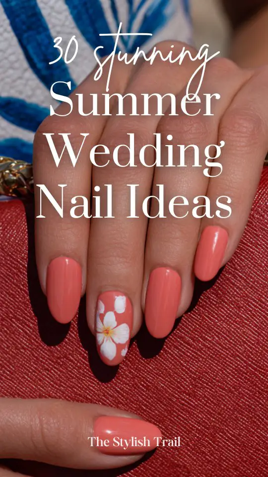 Hands with long, glossy coral summer wedding nails and floral details