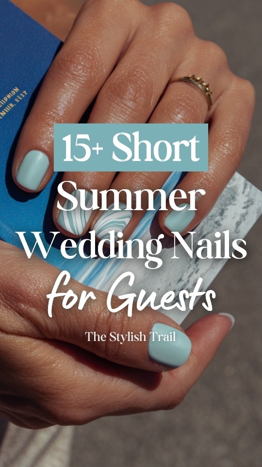 Short summer wedding guest nails with pastel blue polish and elegant white swirl accent design