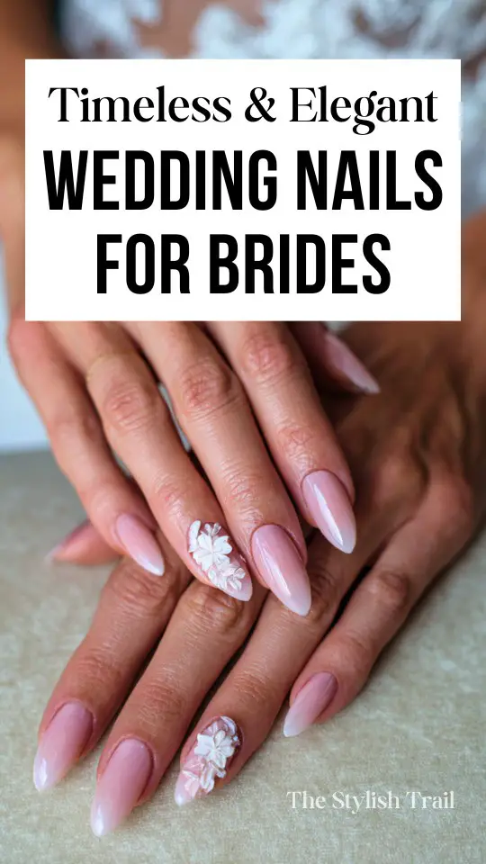 hands of a bride with pink glossy nails and floral details
