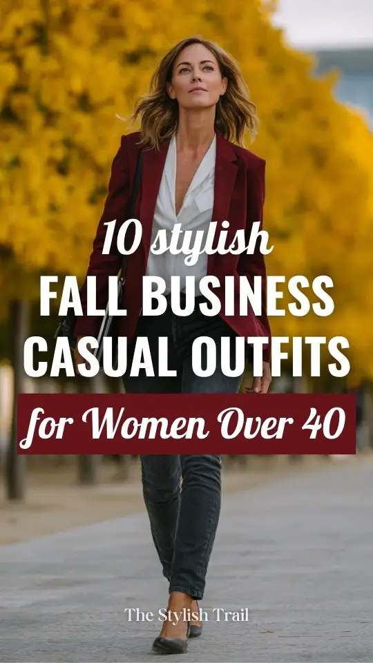 A woman over 40 wears a fall business casual outfit with a burgundy blazer layered over a white blouse with dark jeans and heels
