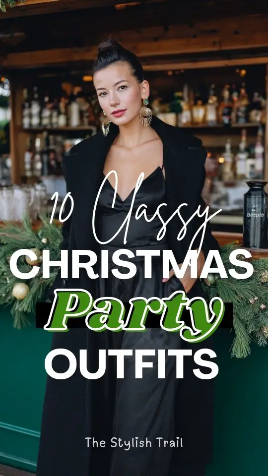 A woman in a Christmas party outfit with a black satin midi dress with a long tailored coat and bold earrings
