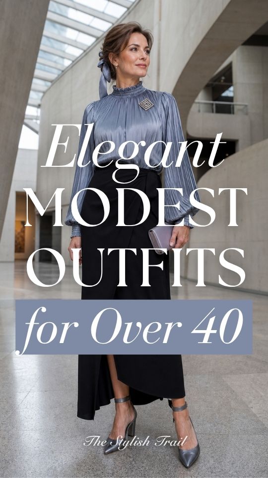 a woman over 40 in a modest outfit with a slate blue pleated blouse with long sleeves and a black skirt, matching heels
