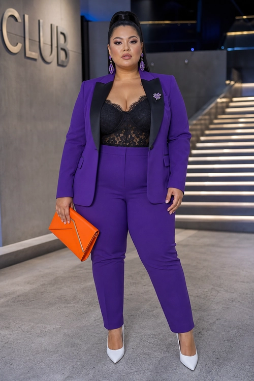 Purple Suit with Black Lace Top A tailored purple blazer and trousers styled with a black lace-trim top, orange clutch, and white pointed-toe pumps.