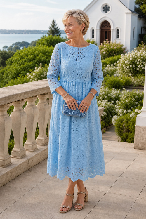 Woman in a light blue mother-of-the-bride dress.